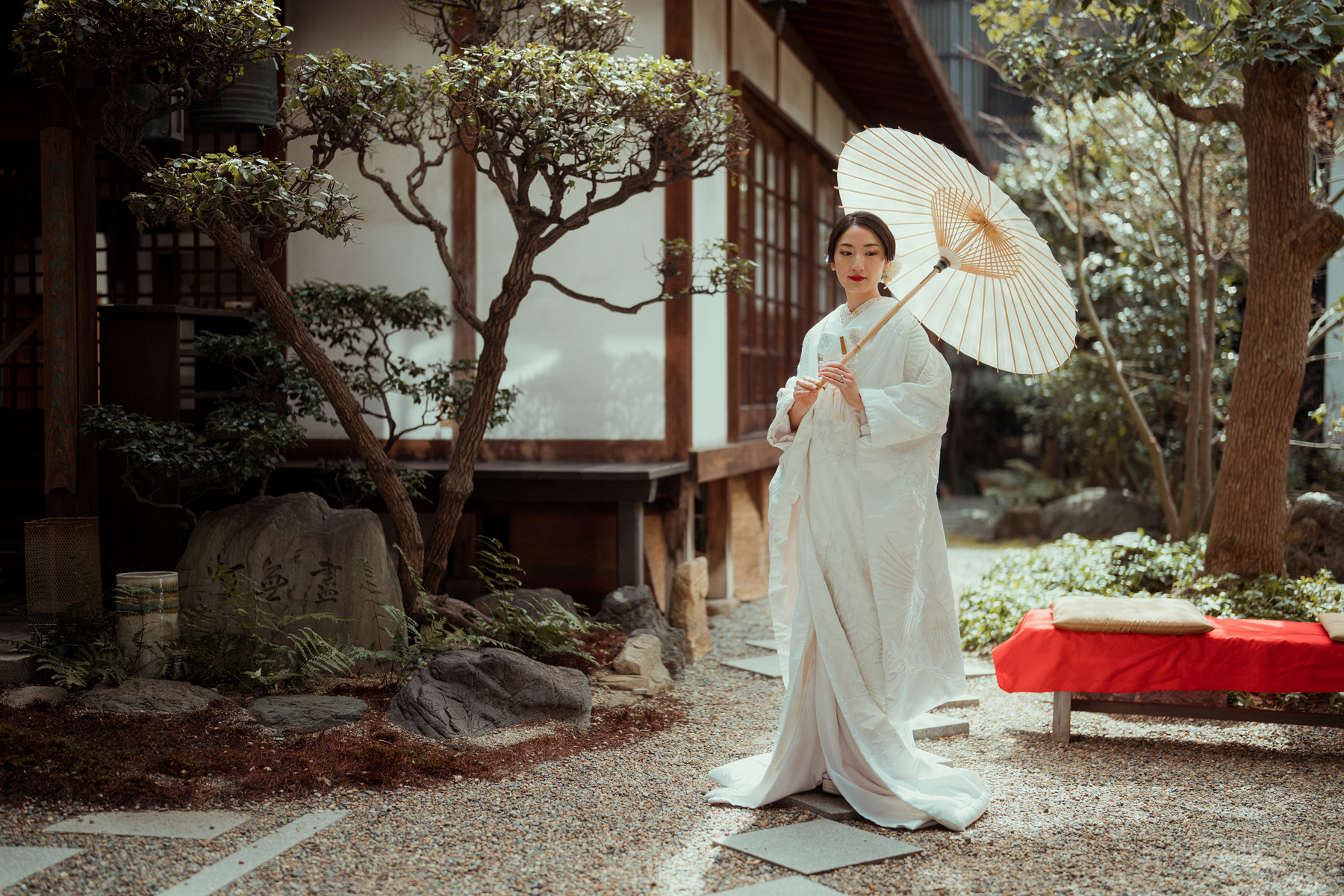 Japanese Woman in Wedding Kimono Holding Wagasa